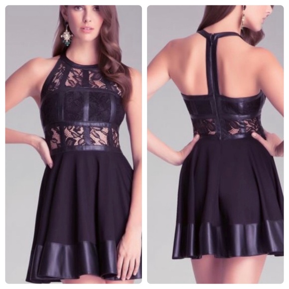 bebe Dresses & Skirts - bebe Fit & Flare Leatherette T Strap Mini Dress